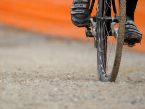 Cyclo-cross wheel and shoes (licensed on Flickr by  Musume Miyuki under CC BY SA 2.0)