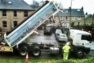 Road resurfacing (copyright Simon MacMichael)