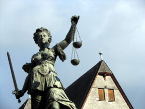 Scales of Justice (CC BY-SA 2.0 licenced by Michael Coghlan:Flickr)