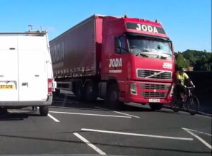 Still taken from YouTube video of Joda Freight truck and cyclist