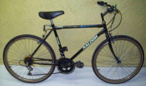 Photo of blue bike similar to that ridden by Derek Abbott, released by Surrey Police