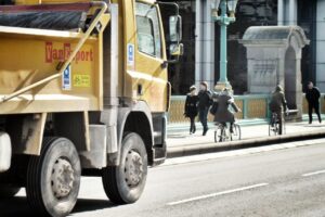 Tipper truck and cyclists (copyright Simon MacMichael)