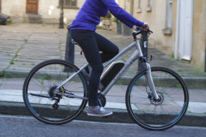 Carrera Crossfire-E Womens Electric Bike - riding 1.jpg