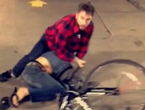 Cyclist wrestles bike thief (Fast Folks Cyclery Instagram video still).JPG
