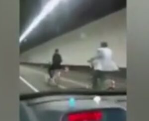 Cyclists in Queensway tunnel (taken from YouTube video).jpg