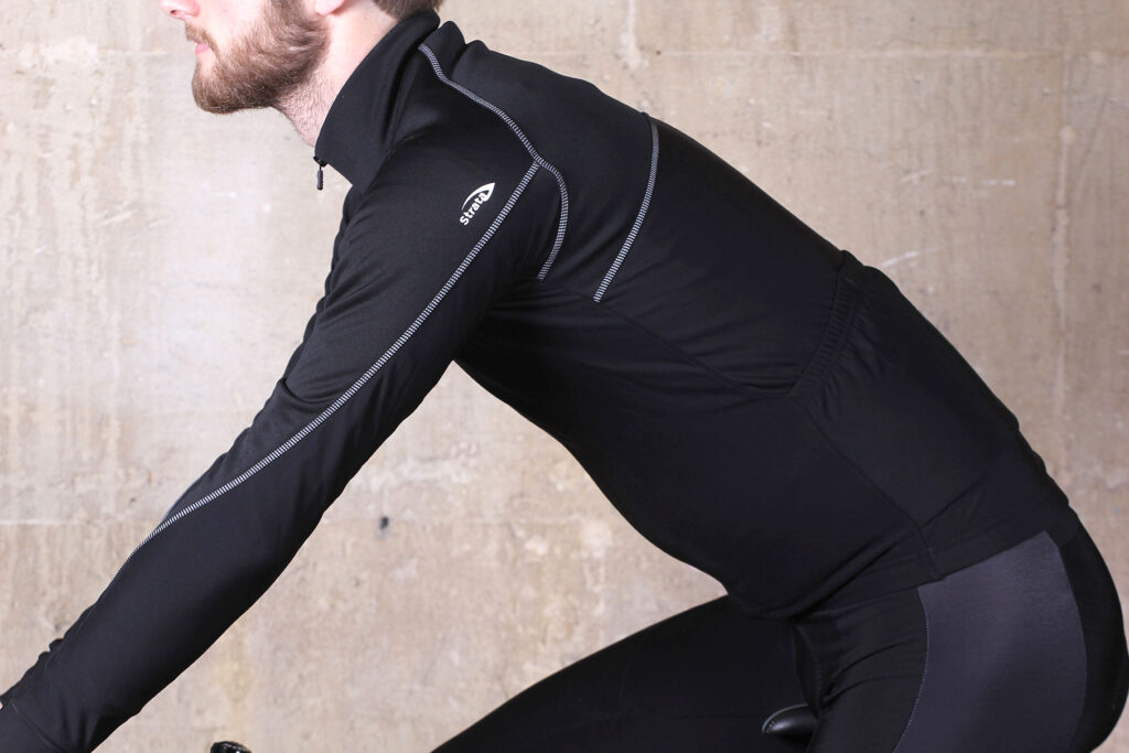 Primal Fusion Thermal Cycling Jacket – riding.jpg
