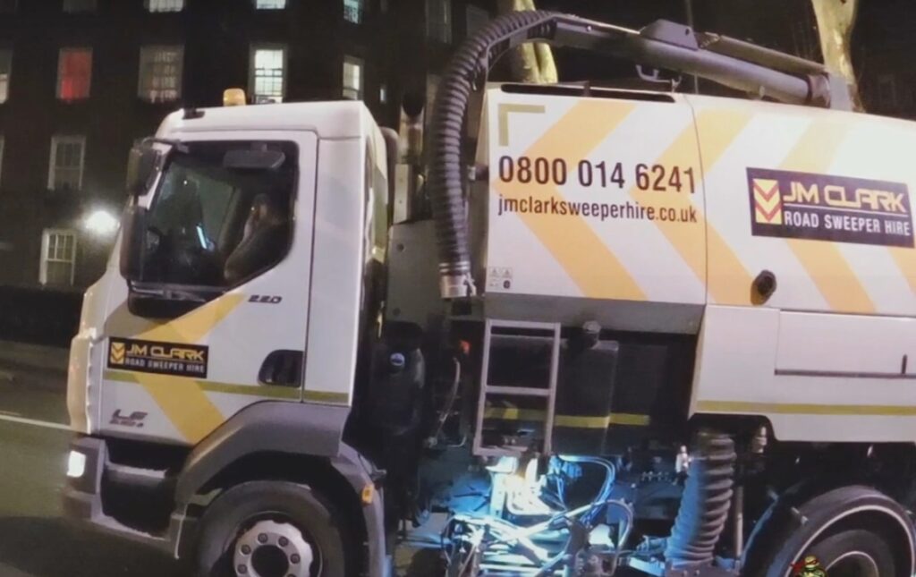 Driver of JM Clark Ltd vehicle using mobile phone at the wheel (image via YouTube).jpg