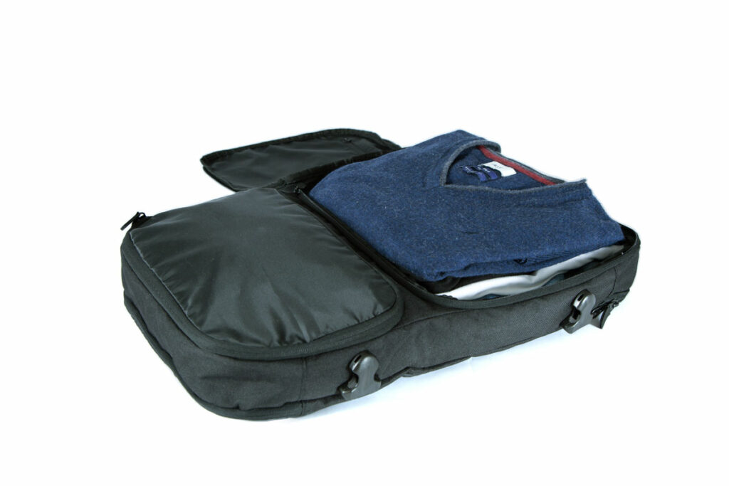 Slicks Travel System – Tripcover-with-clothes.jpg