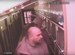 Van den Driessche family stealing Lancashire parakeets (taken from YouTube).jpg