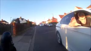 Bristol Driver leans out of window (Dave Edmonds Facebook video still).PNG