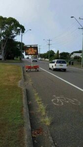 Give Cyclists Space sign in bike lane Sydney (source Matt Howell on Facebook).jpg