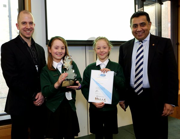 Lord Ahmad presenting Rawdon Littlemoor Primary School with National STARS award.jpg