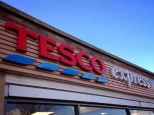 Tesco Express fascia (copyright Simon MacMichael).jpeg