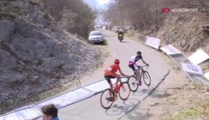 Barriers blown over by helicopter at Tour of Croatia video still.JPG