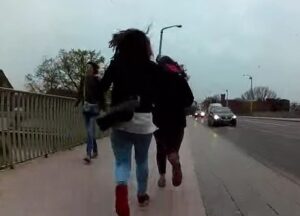 Cyclist thwarts street robbery in Wroclaw (YouTube still).JPG