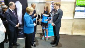 Denise Schindler with Angela Merkel and Barack Obama (source Facebook).jpg