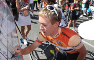 Cameron Meyer signing on at Santos Tour Down Under (pic Santos Tour Down Under)