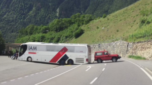 IAM team bus at Tour de Suisse (source IAM Cycling Twitter video still).PNG