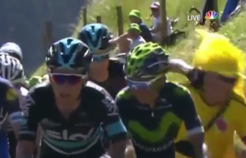 Froome smacks encroaching fan.PNG