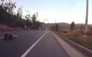 Cyclist and bike part ways (via Facebook video).jpg
