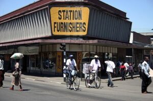 Cyclists in Harare (CC licensed by Carrie Cizauskas via Flickr).jpg