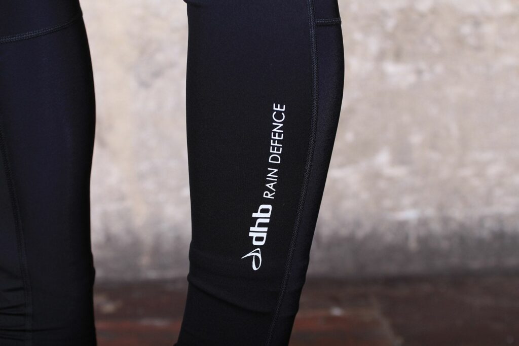 dhb Aeron Rain Defence Leg Warmers – logo.jpg