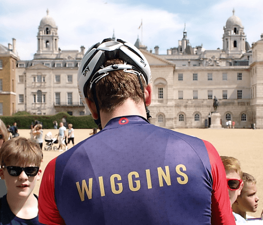 Sir Bradley Wiggins signs autographs (copyright Simon MacMichael).PNG