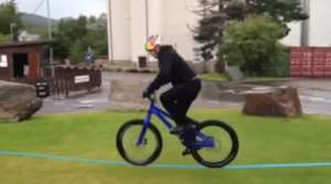 Danny MacAskill rides a slackline.PNG
