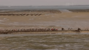 Tour de France 2011 crosses the Passage du Gois (TV video still).PNG