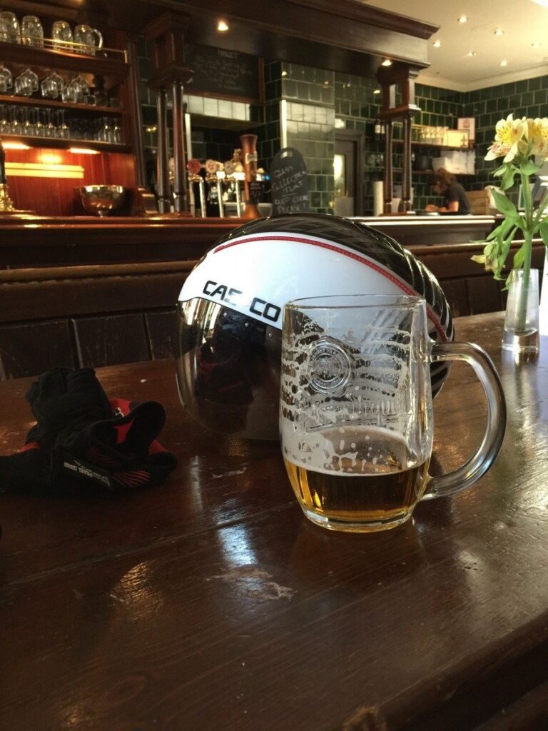 Beer and a helmet – image via Judge dreadful on roadcc