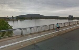 Cyclist on Canberra’s Commonwealth Bridge (via StreetView).jpg