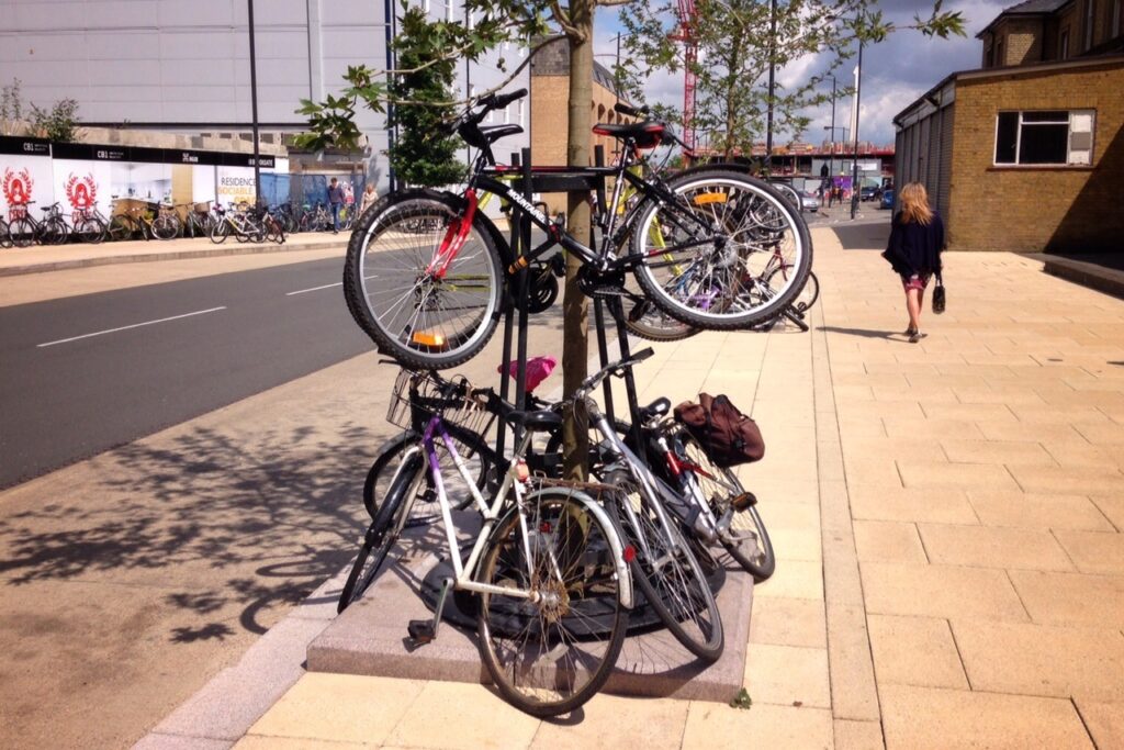 Bicycles parked at Cambridge Railway Station (copyright Simon MacMichael).jpg