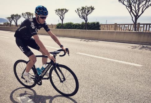 Chris Froome back on his bike (via Chris Froome on Twitter).JPG