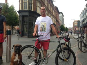 Sam's Dad Jeff with bike painted by Sam.JPG