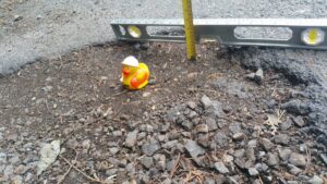 Surrey pothole (Barzi28 via Twitter).jpg