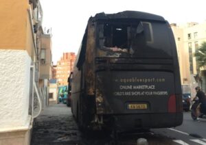 Aqua Blue team bus after arson attack (via Twitter).JPG