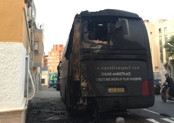 Aqua Blue team bus after arson attack (via Twitter).JPG