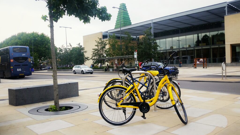 Ofo bikes outside Said Business School in Oxford (Simon MacMichael).jpg