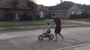 FAther teaching kid to ride – soiurce Reddit.PNG