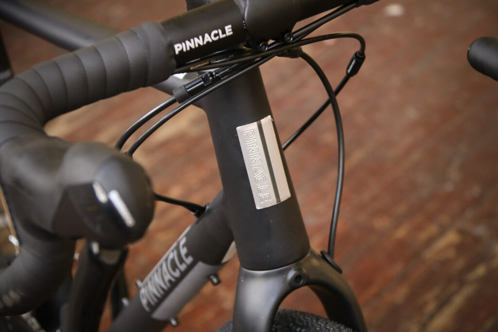 Pinnacle Arkose Three – head tube badge.jpg