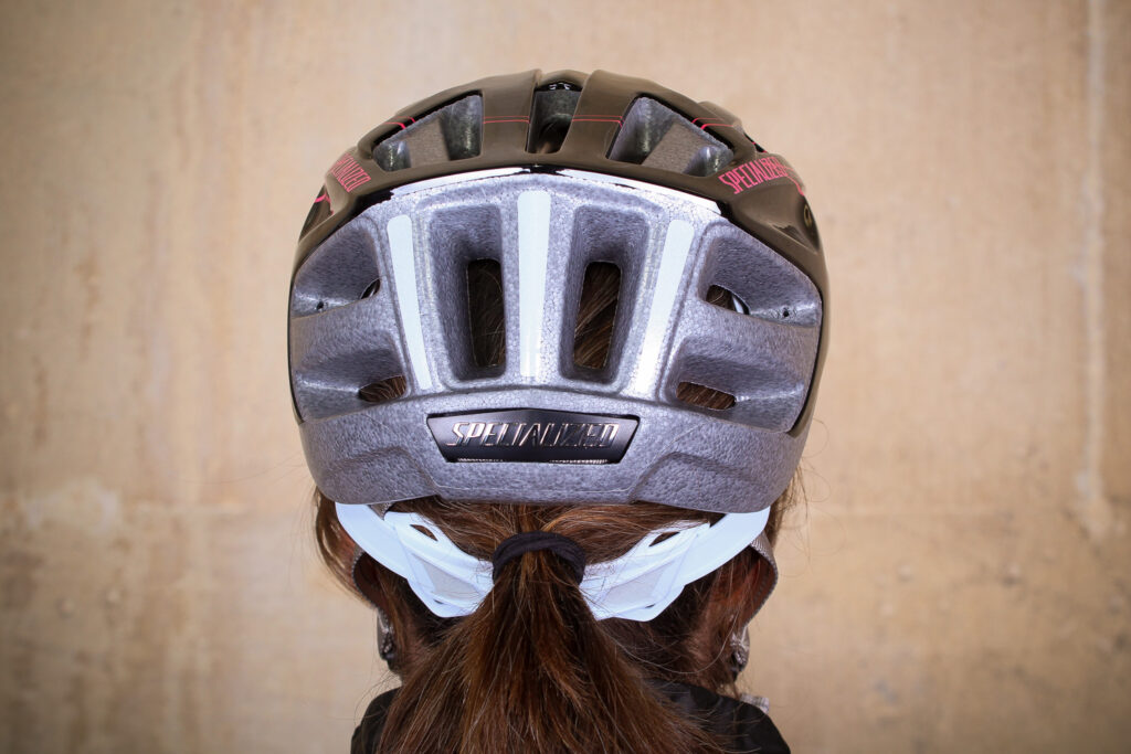 Specialized Sierra Gloss Acid Pink Arc Womens Helmet – back hairport in use.jpg