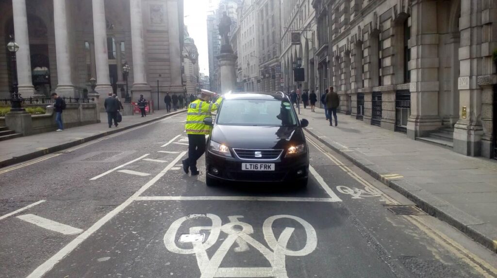 Police officer speaks to driver at Bank Junction (picture courtsesy Bikesy.co_.uk).jpg