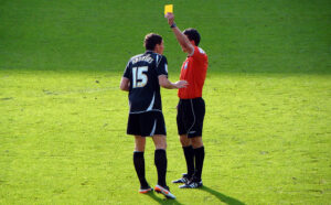 Yellow card (licensed CC BY-SA 2.0 on Flickr by Jon Candy).jpg