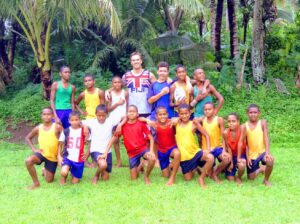 Jack Berry – Visiting Fiji with kids of Nakobo Village, Savusavu, Fiji – 2013 (picture via Jack Berry Fijian Foundation on Virgin Money Giving)