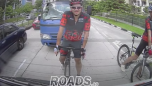 Singapore cyclist and lorry (video still via ROADS.sg on Facebook).PNG
