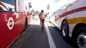 Naked cyclist v London traffic by Cy Wol (video still)