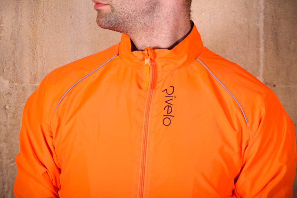 Rivelo Newington Reversible Jacket orange – chest.jpg