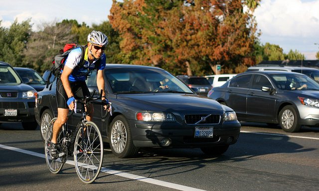 Cyclist and cars – image via Richard Masoner on Flickr.jpg
