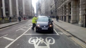 Police officer speaks to driver at Bank Junction (picture courtsesy Bikesy.co_.uk).jpg