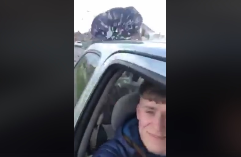 Motorist brakes in front of cyclist (via Facebook)